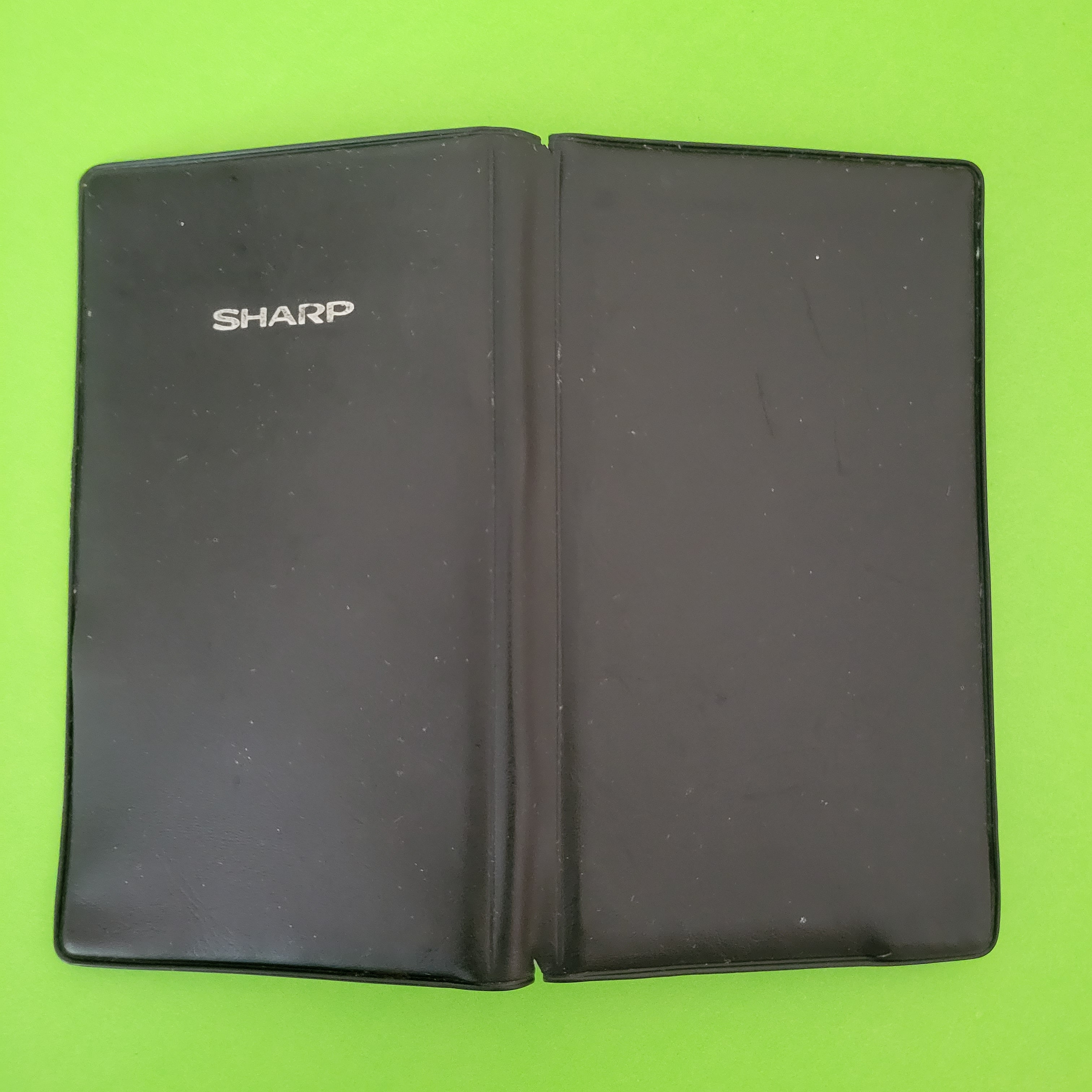 An image of the case of a Sharp EL-512 Scientific/Engineering calculator